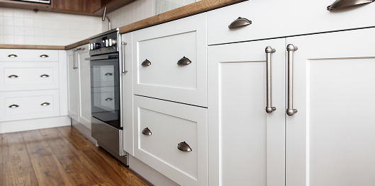 Showroom white kitchen cabinets